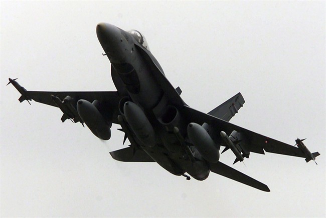 A Canadian CF-18 fighter takes off from CFB Trenton in Trenton. Ont. Thursday October 11, 2001.