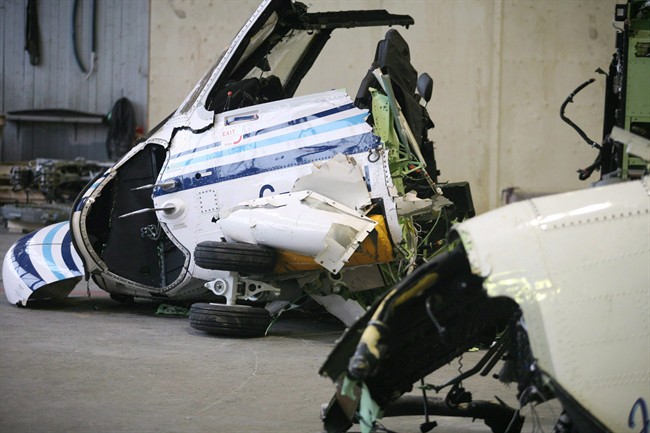 The wreckage of the Cougar Helicopter flight 491 is displayed to the media as the Transportation Safety Board reports on its findings, in St. John's Thursday. March 26, 2009.  