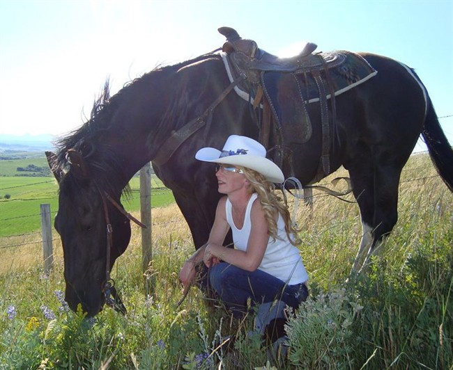 Amber Rancourt is shown in a family handout photo. Raging flood waters killed four people in southern Alberta one year ago. Two were swept away as they tried to evacuate from High River, one of the hardest hit communities. Rancourt was caught off guard while camping south of the town, along the Highwood River. THE CANADIAN PRESS/HO.