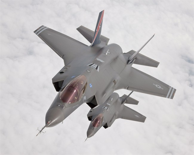 F-35's AF1 and AF2 fly together during test flights in this May 11, 2010 handout photo. 