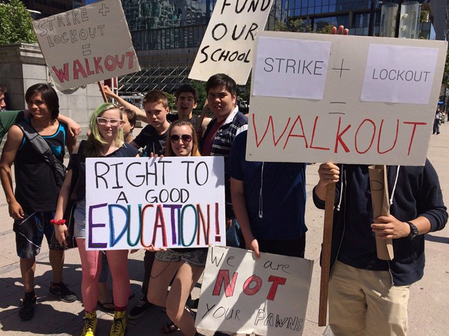 Students rally against both sides of the ongoing B.C. public school labour dispute in Vancouver on June 4, 2014. 