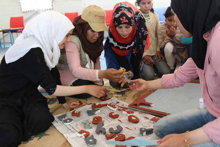 An arts and crafts lesson in Azraq Camp
