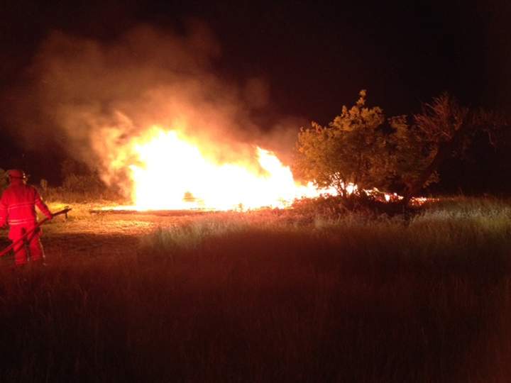The "big house" on the Criddle-Vane homestead, now a park in rural southwestern Manitoba, burns on Wednesday.
