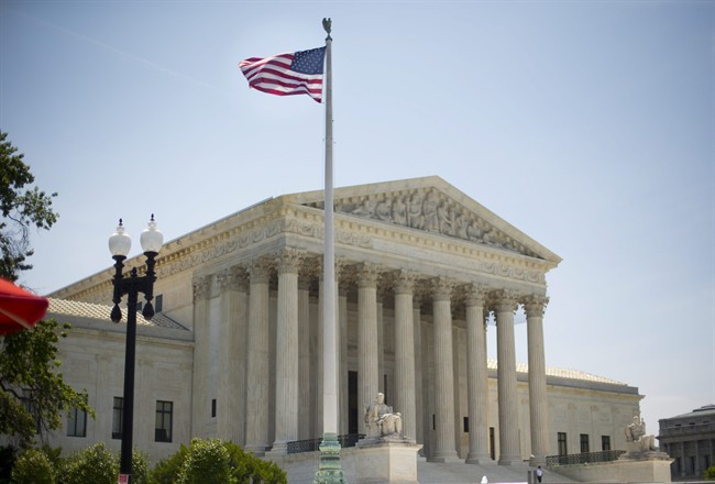 The Supreme Court building in Washington, Monday, June 30, 2014, following various court decisions. The court ruled on birth control, union fees and other cases. 