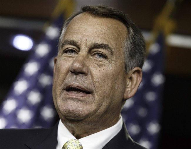 House Speaker John Boehner of Ohio talks to reporters during a news conference on Capitol Hill in Washington, Thursday, June 19, 2014.