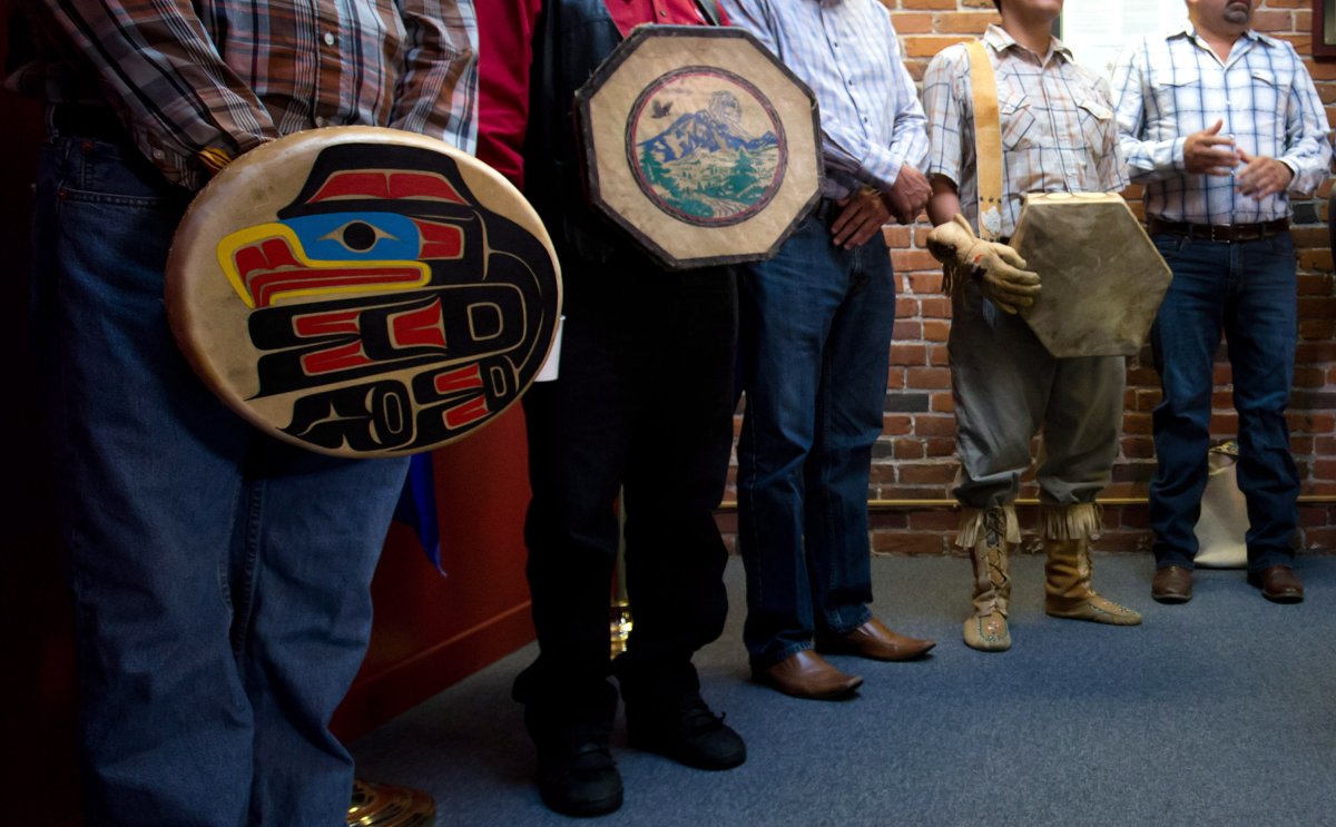First Nations chiefs hold drums. Tsilhqot'in Nation.