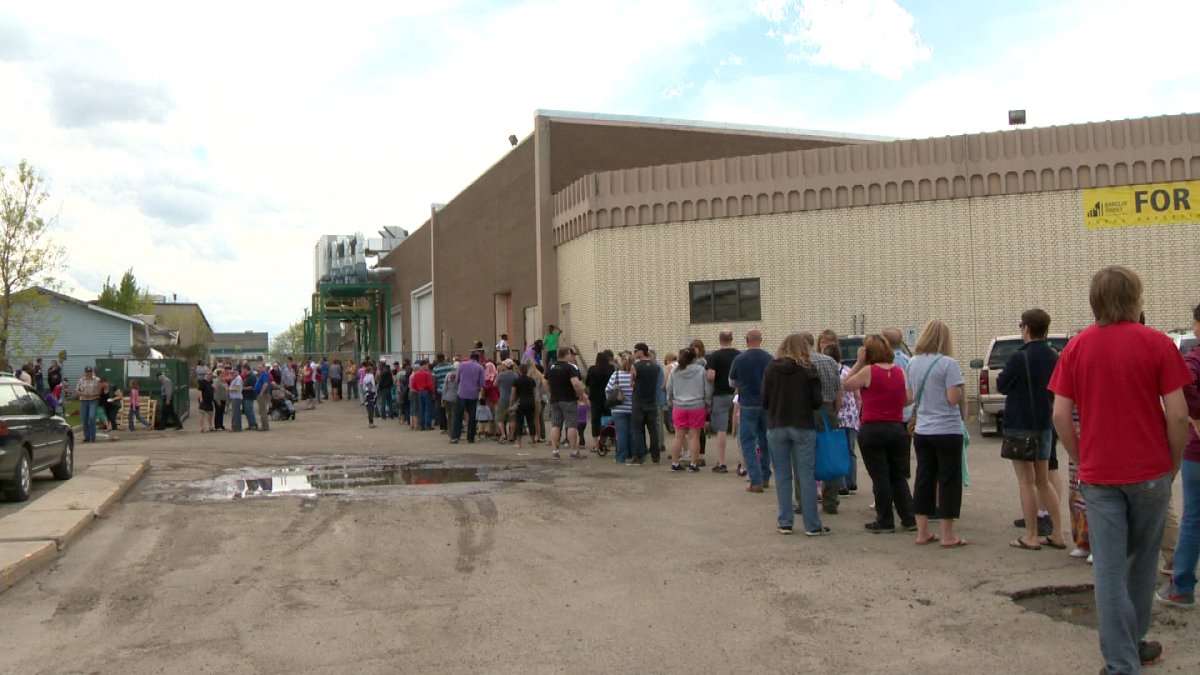 Droves line up at charity’s warehouse - image