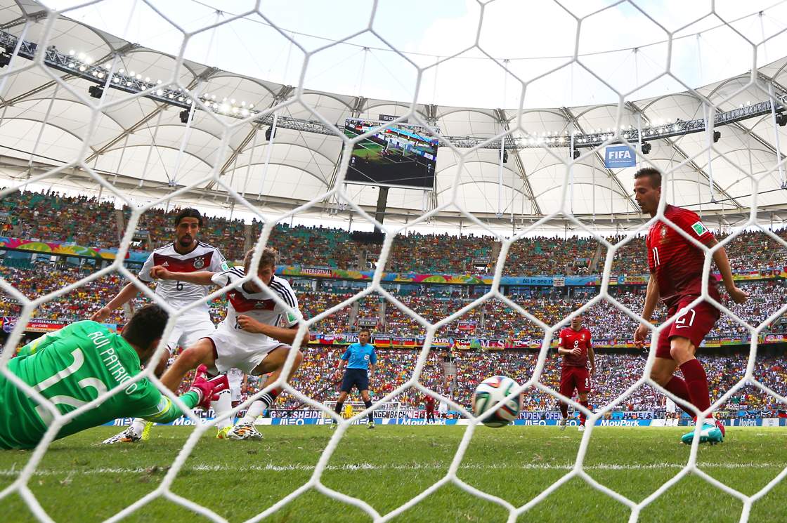 Thomas Mueller of Germany scores during the FIFA World Cup Brazil Group G match between Germany and Portugal at Arena Fonte Nova on June 16, 2014 in Salvador, Brazil. (Photo by Clive Brunskill/Getty Images)