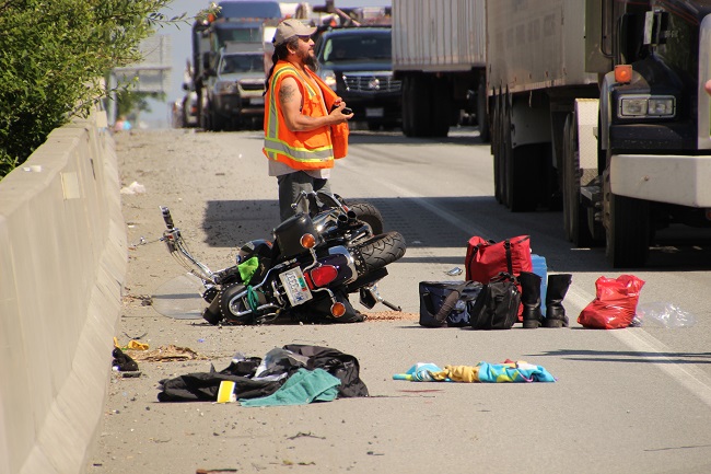 The crash occurred on Highway 1 westbound near 200 St. Credit: Shane MacKichan, Global News.
