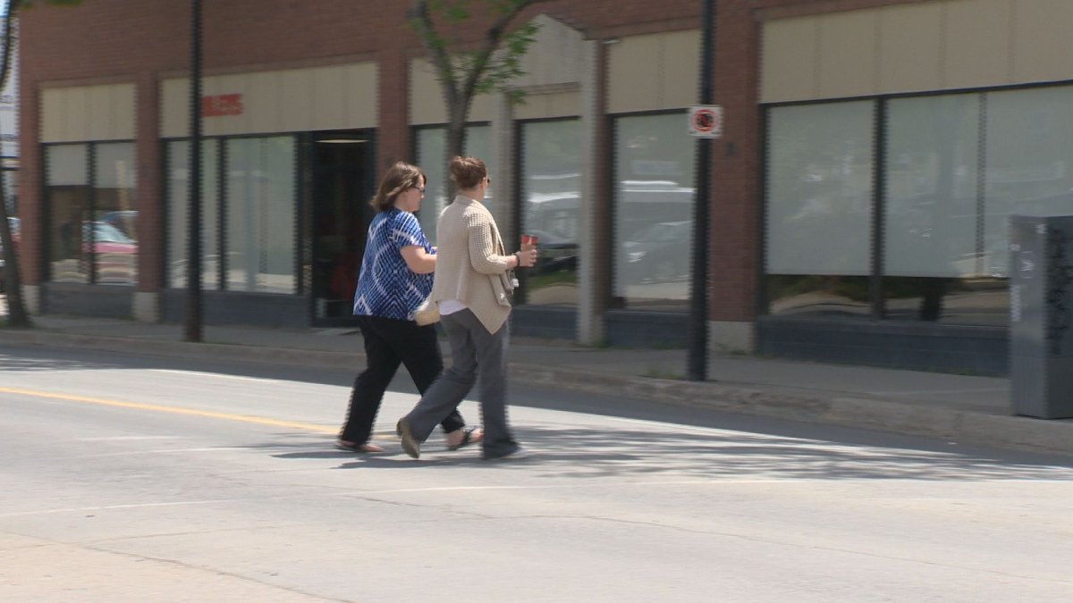 Jaywalking can carry a $50 fine when it impedes traffic, unlike the scene in this photo.