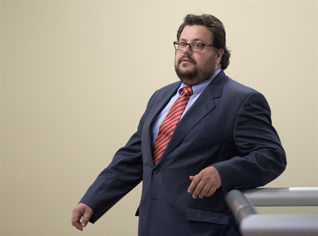 In this 2014 file photo, former Quebec Liberal cabinet minister Tony Tomassi arrives in Quebec City. Tomassi is reported to be one of six men arrested for solicting a prostitue in a Montreal police sting on Friday, Nov. 17, 2016.