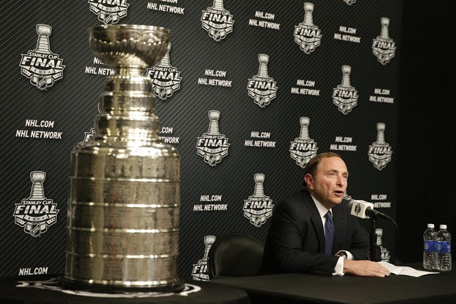 NHL Commissioner Gary Bettman speaks during a news conference before Game 1 of the NHL Stanley Cup Final hockey series between the Los Angeles Kings and the New York Rangers on Wednesday, June 4, 2014, in Los Angeles. (AP Photo/Jae C. Hong).