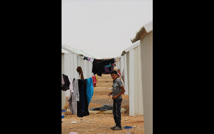 Laundry hangs to dry between shelters in Azraq camp