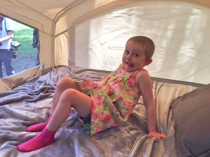 Aiva, 3, sits in her brand new tent trailer Thursday, June 12, 2014.