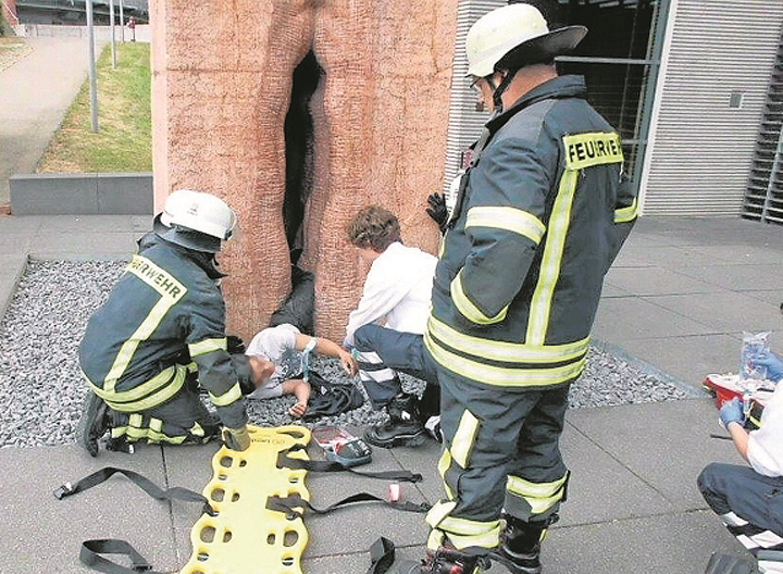 A U.S. exchange student was delivered by firefighters after the man became stuck inside a giant stone vagina sculpture.