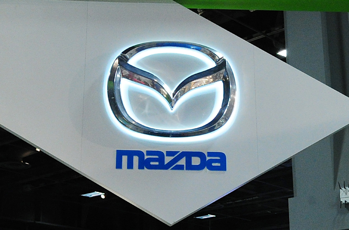 The Mazda logo is seen February 2, 2012 at the 2012 Washington Auto Show at the Walter E. Washington Convention Center in Washington, DC. 