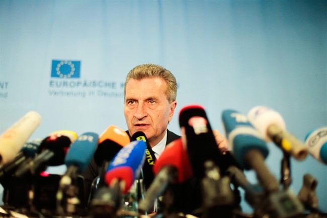 European Union energy commissioner Guenther Oettinger addresses a news conference as part of a meeting of the European Union, Russia's energy minister Alexander Novak and Ukraine's energy minister Yuri Prodan about Ukrainian future gas supply in Berlin, Friday, May 30, 2014. (AP Photo/Markus Schreiber)