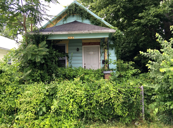 A Monday June 16, 2014, photo is of a vacant house in Dayton, Ohio. An adolescent boy found the mummified body of a man hanging in a closet in the house on Sunday while exploring what he thought to be an abandoned house.