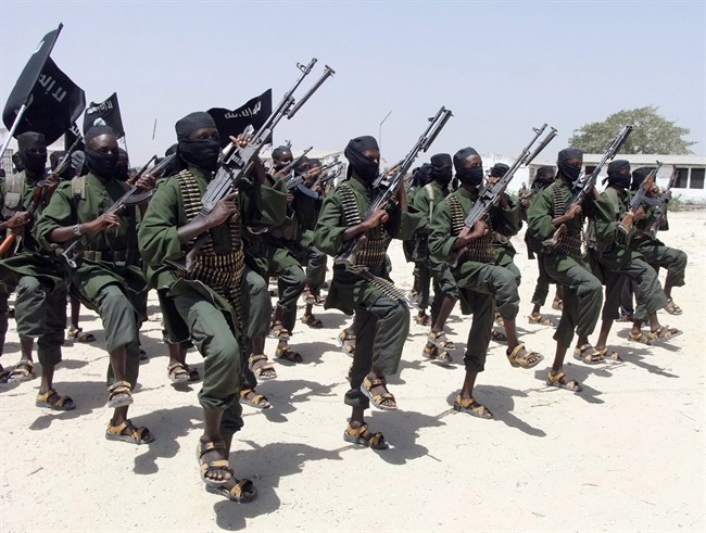 Hundreds of newly trained al-Shabab fighters, above, in 2011.