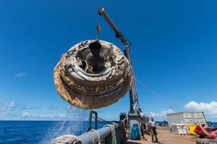 Hours after the June 28, 2014, test of NASA’s Low-Density Supersonic Decelerator over the U.S. Navy’s Pacific Missile Range, the saucer-shaped test vehicle is lifted aboard the Kahana recovery vessel.
