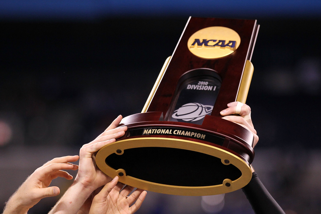INDIANAPOLIS - APRIL 05: The Duke Blue Devils hold up the national championship trophy as they celebrate after their 61-59 win against the Butler Bulldogs during the 2010 NCAA Division I Men's Basketball National Championship game at Lucas Oil Stadium on April 5, 2010 in Indianapolis, Indiana. (Photo by Andy Lyons/Getty Images)