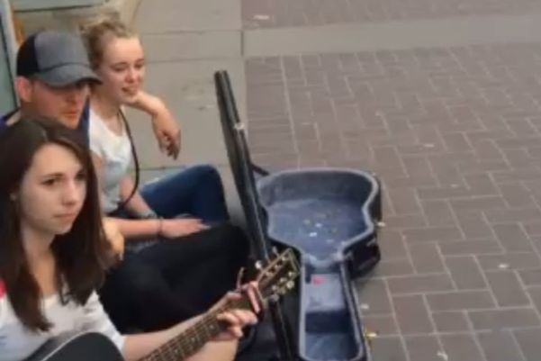 Michael Bublé sings with buskers ahead of his Calgary concert, on June 23rd, 2014.