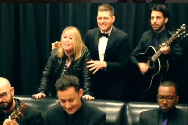 Michael Bublé sings with Jann Arden backstage at Calgary concert