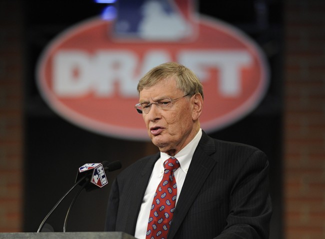 Commissioner of Major League Baseball Bud Selig announces the selections during the 2014 MLB baseball draft Thursday, June 5, 2014, in Secaucus, N.J. (AP Photo/Bill Kostroun).