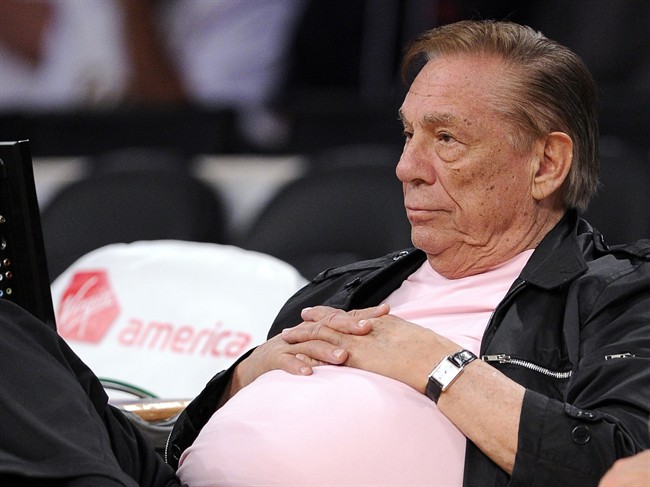 In this Oct. 17, 2010 file photo Donald Sterling watches the Los Angeles Clippers play in Los Angeles.
