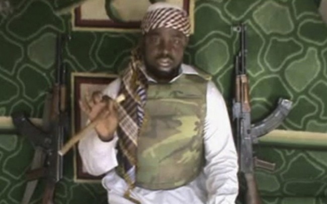 FILE - This file image made available from Wednesday, Jan. 10, 2012, taken from video posted by Boko Haram sympathizers shows Imam Abubakar Shekau, the leader of the radical Islamist sect. 