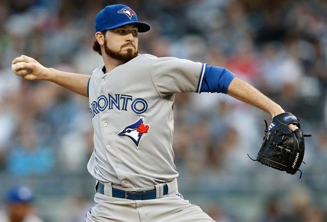 Toronto Blue Jays starting pitcher Drew Hutchison delivers in the first inning against the New York Yankees at Yankee Stadium in New York, Thursday, June 19, 2014. A.
