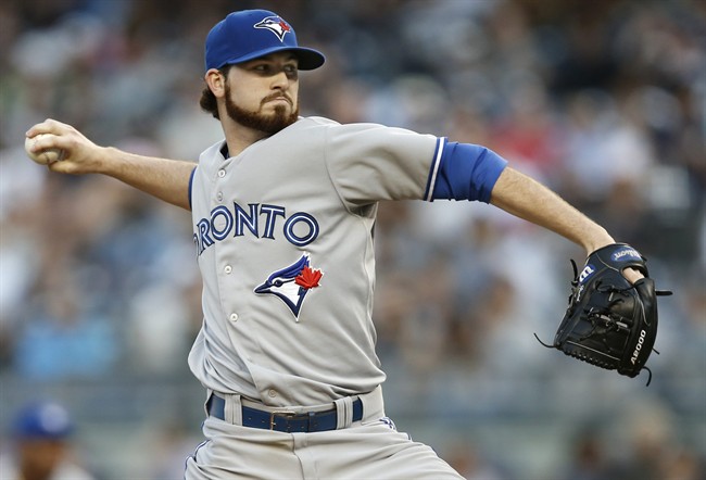 Toronto Blue Jays starting pitcher Drew Hutchison delivers in the first inning against the New York Yankees at Yankee Stadium in New York, Thursday, June 19, 2014. A.