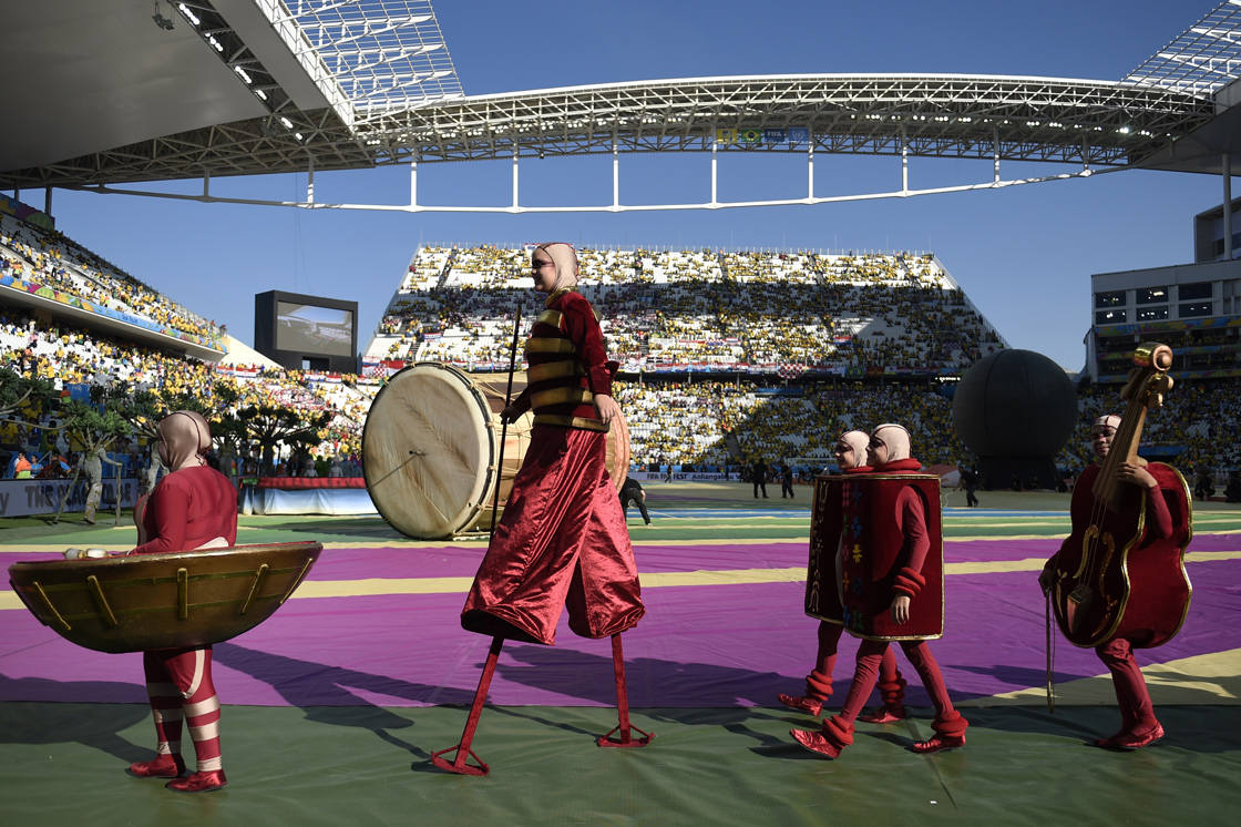Performers take part in the opening ceremony of the 2014 FIFA World Cup at the Corinthians Arena in Sao Paulo on June 12, 2014. AFP PHOTO / ODD ANDERSEN (Photo credit should read ODD ANDERSEN/AFP/Getty Images)