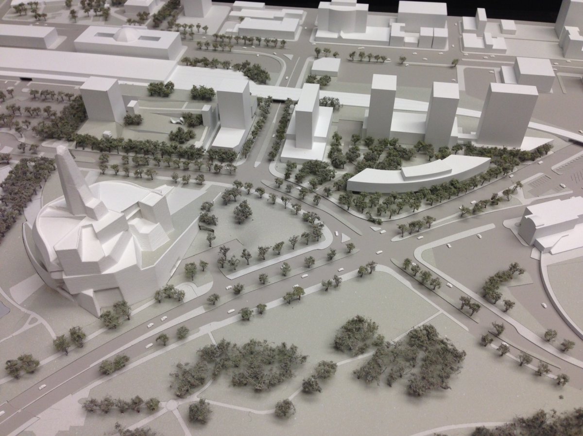 A model shows what the two parking lots at The Forks could become .