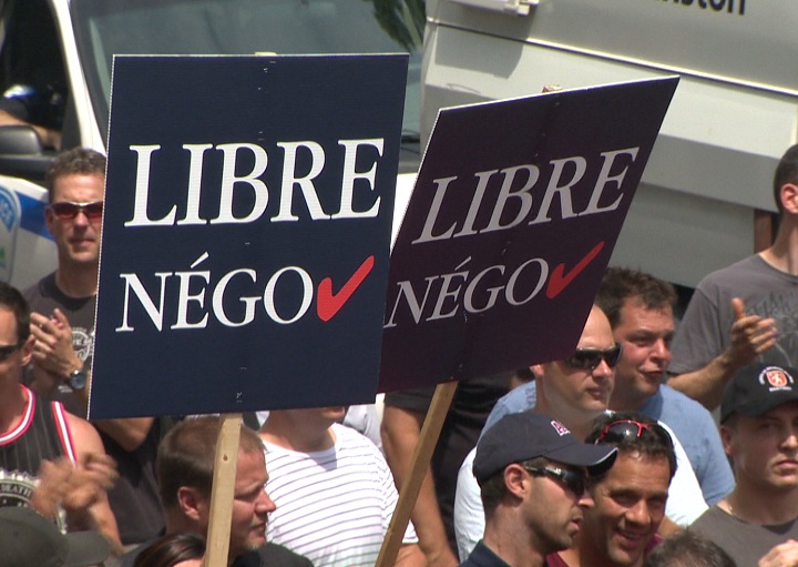 Hundreds of city workers in Montreal participated in protests with firefighters lighting hats on fire to show their frustration with proposed pension reforms on June 17, 2014.
