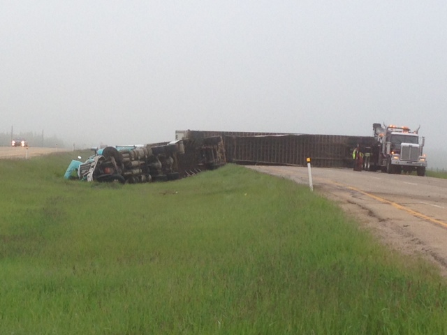Collision on Highway 16 at Range Road 212. A minivan and two tractor trailers collided in the early morning hours, when thick fog blanketed the region. 
June 17, 2014. 

