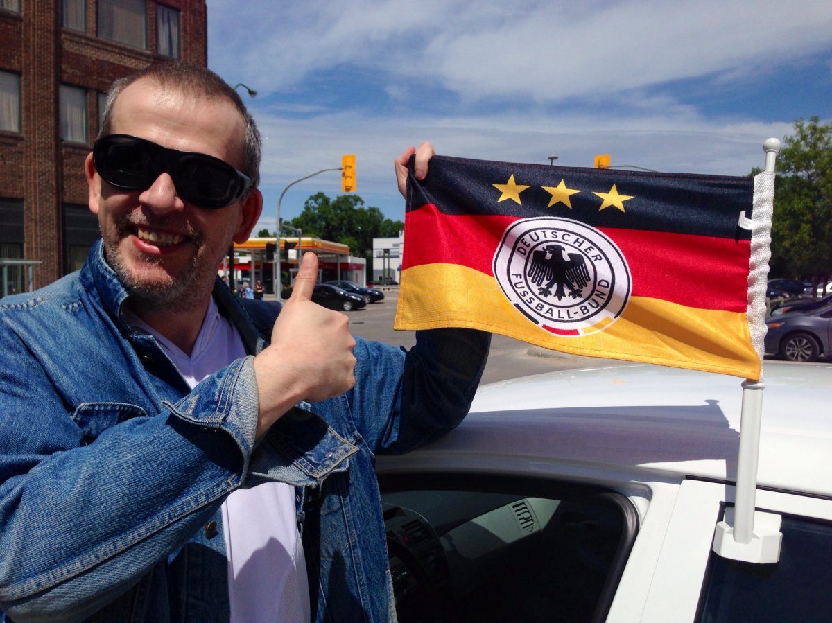 Mike Okrainec proudly flies the German flag on his car during World Cup. 
