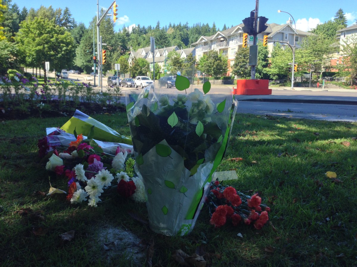 Flowers being left in memory of 71-year-old Betty Pleshko who was killed at a busy intersection in Port Moody Tuesday afternoon. 