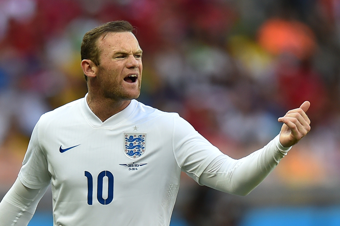 England's forward Wayne Rooney reacts after a challenge from Costa Rica's defender Junior Diaz during the Group D football match between Costa Rica and England at The Mineirao Stadium in Belo Horizonte on June 24, 2014,during the 2014 FIFA World Cup. AFP PHOTO / BEN STANSALL (Photo credit should read BEN STANSALL/AFP/Getty Images)
