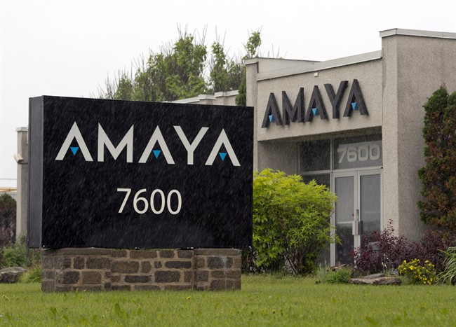 The Amaya Gaming Group headquarters are seen Friday, June 13, 2014 in Montreal. The company has acquired Pokerstars and Full Tilt Poker for $4.9 billion.