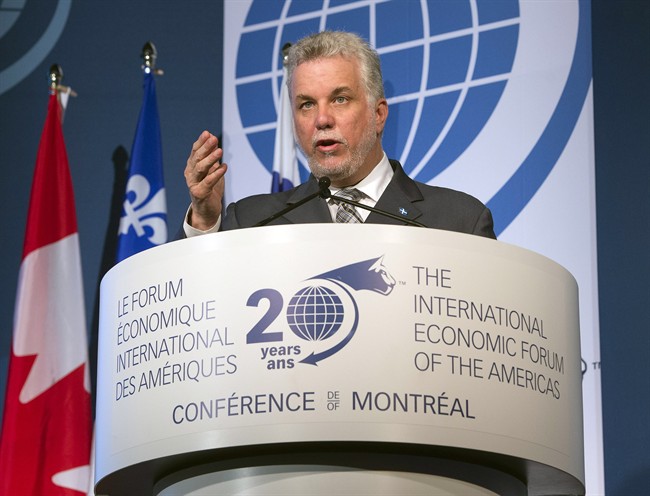 Quebec Premier Philippe Couillard addresses delegates at the 20th Conference of Montreal Monday, June 9, 2014 in Montreal.