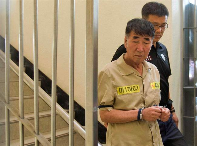 Lee Joon-seok, the captain of the sunken South Korean ferry Sewol, arrives at Gwangju District Court in Gwangju, South Korea, Tuesday, June 10, 2014. 