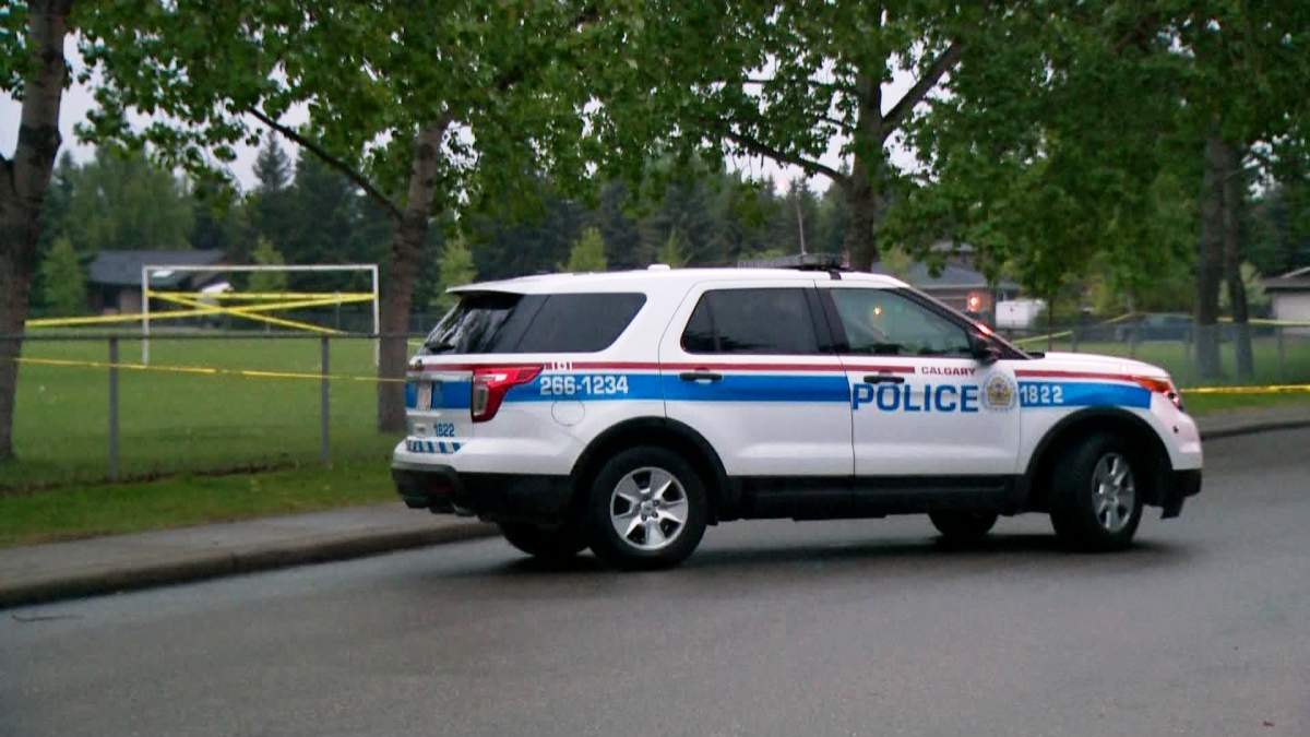 Police tape off an area by St. Catherine School off Elbow Drive and Canata Close S.W. as they investigate a sexual assault.