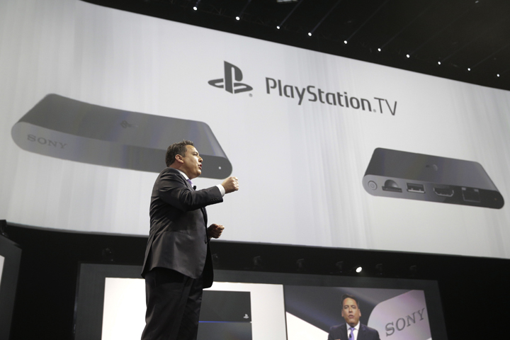 Shawn Layden, president and CEO of Sony Computer Entertainment America, introduces the PlayStation TV during a presentation at the Electronic Entertainment Expo on Monday, June 9, 2014, in Los Angeles. 