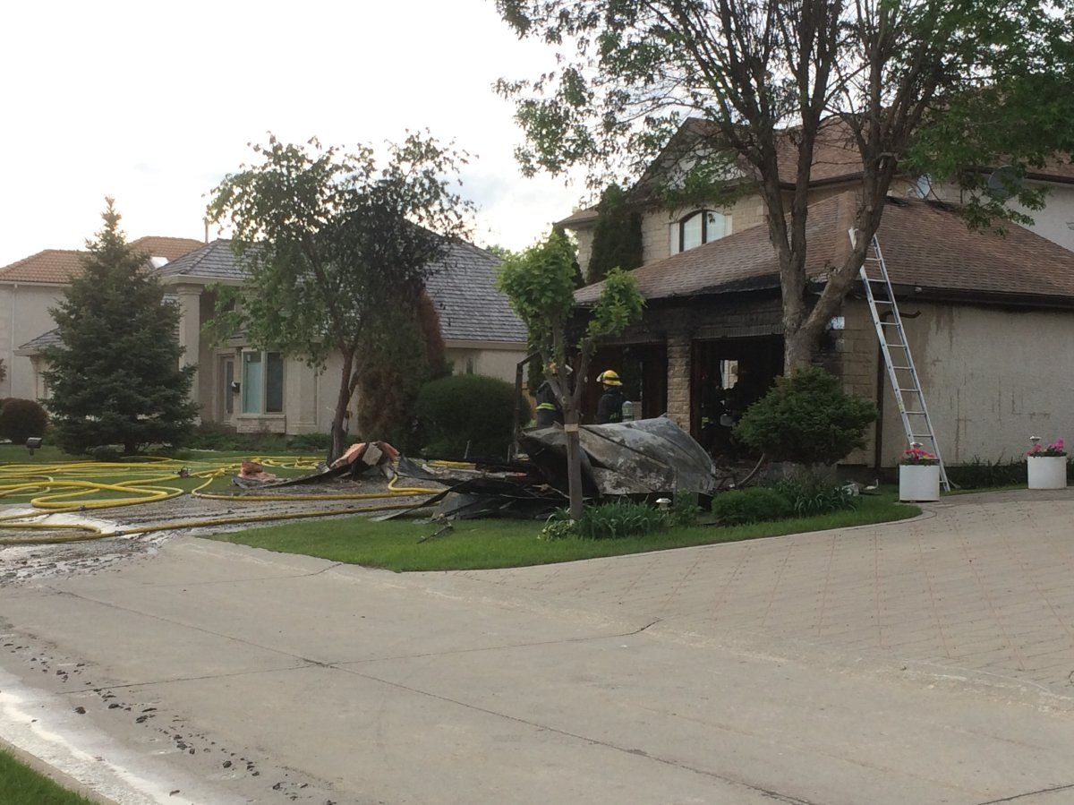 Winnipeg Fire crews battled  large garage fire on West Taylor Blvd in Tuxedo June 6, 2014.
