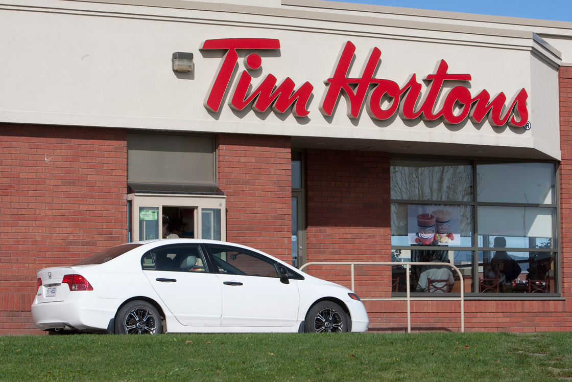 Tim Hortons is introducing a new loyalty program this week via a credit card partnership with CIBC and Visa.