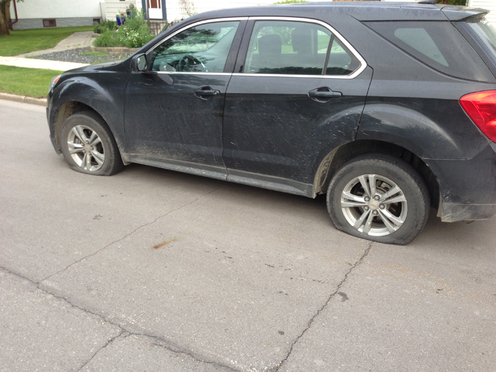 Slashed tires prevented the Winnipeggers who own this car from getting to daycare and work on Thursday morning.