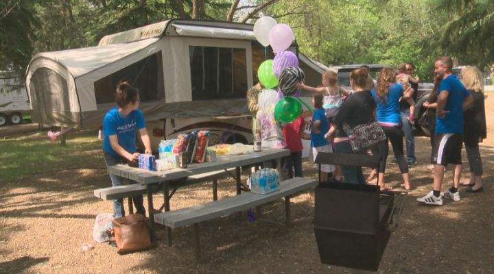 The Make-A-Wish Foundation presents Aiva and her family with a brand new tent trailer.