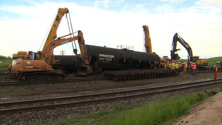 Tanker cars carrying crude oil that derailed in Winnipeg on Friday, June 20, 2014