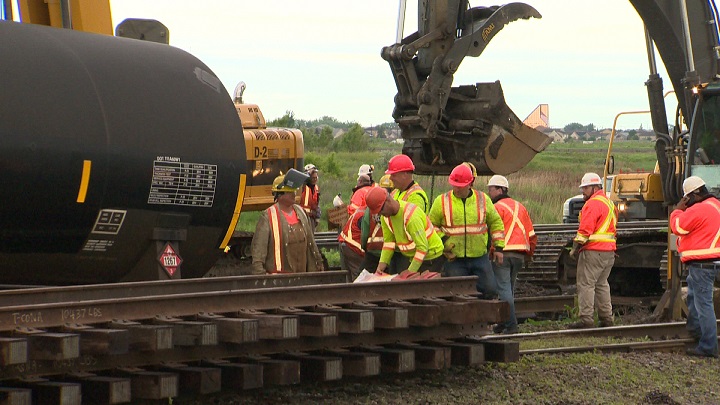 Tanker cars carrying crude oil that derailed in Winnipeg on Friday, June 20, 2014
